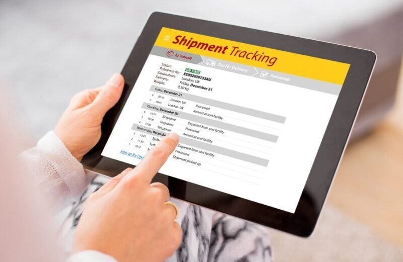 Person tracking shipment on tablet